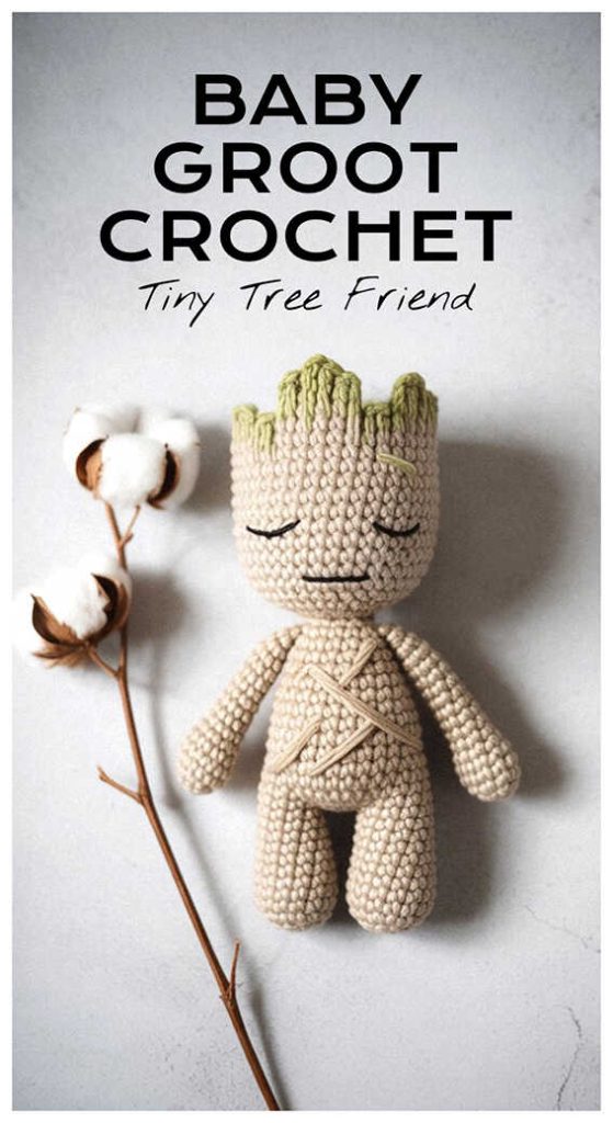 Baby Groot crochet doll with tiny tree texture details displayed on wall, styled as a handmade amigurumi gift idea for Groot lovers.