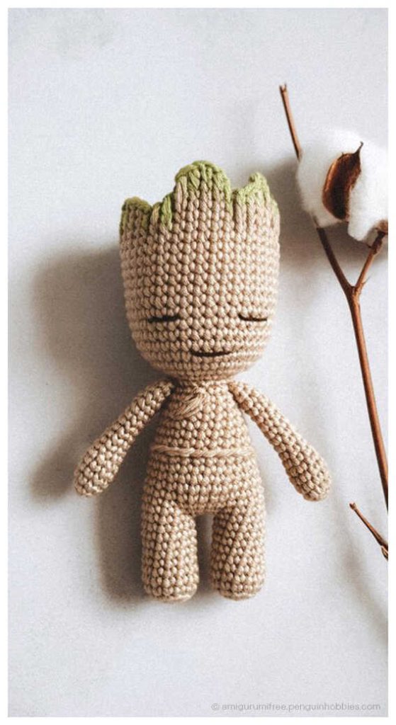 Baby Groot amigurumi crochet doll with simple tree texture, styled as a handmade Marvel themed gift idea for desk decor or collectible display.