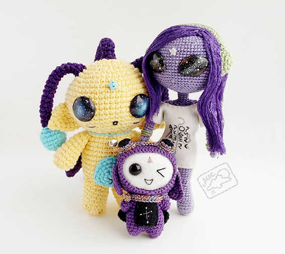 Cute alien friend amigurumi crochet toys with galaxy eyes and colorful details, handmade space themed plush characters, free crochet pattern for a fun sci fi gift idea.