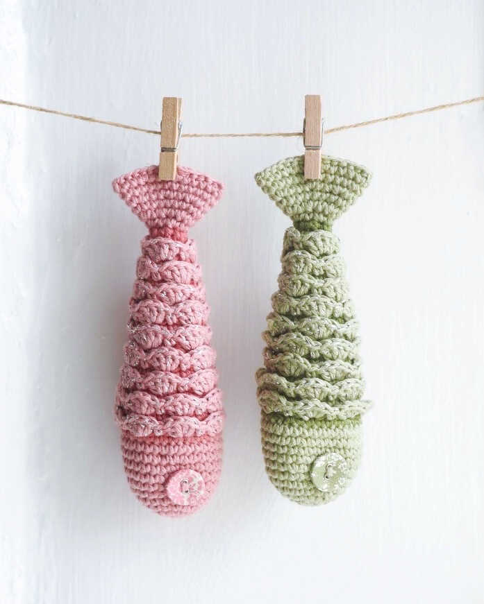 Colorful fish amigurumi crochet plush toy with soft yarn texture, handmade sea creature design, free crochet pattern for a cute gift or nursery decor.