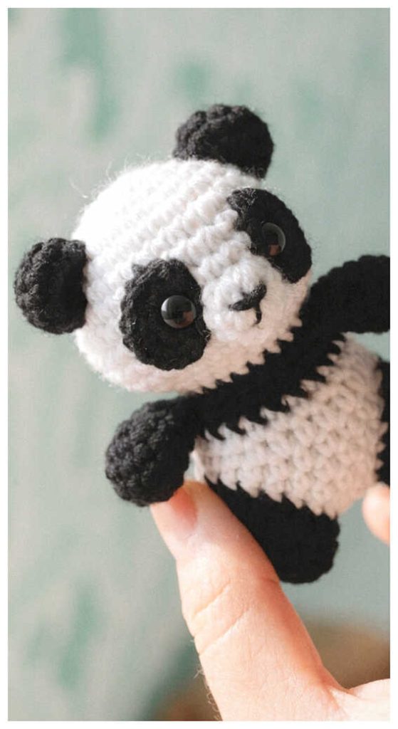 mini panda amigurumi crochet in hand cute plush toy cozy handmade idea