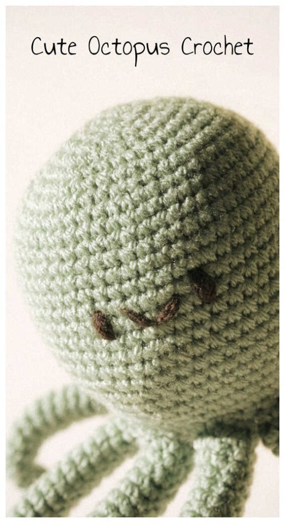 Cute octopus amigurumi plush displayed in soft neutral lighting