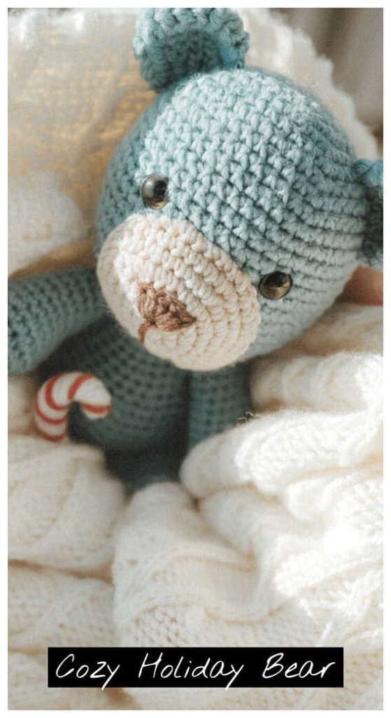 Sleepy crochet bear plush resting in a cozy bed setting