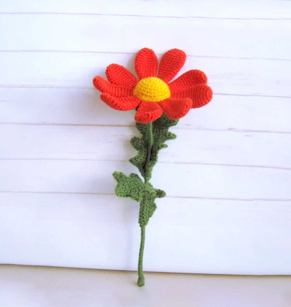 Crochet flower with stem and leaves