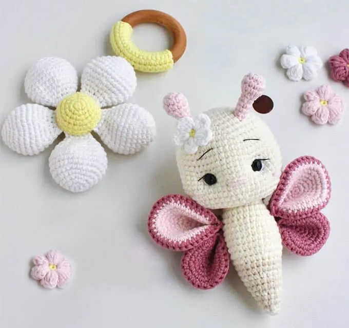 Butterfly amigurumi crochet plush toy and flower rattle
