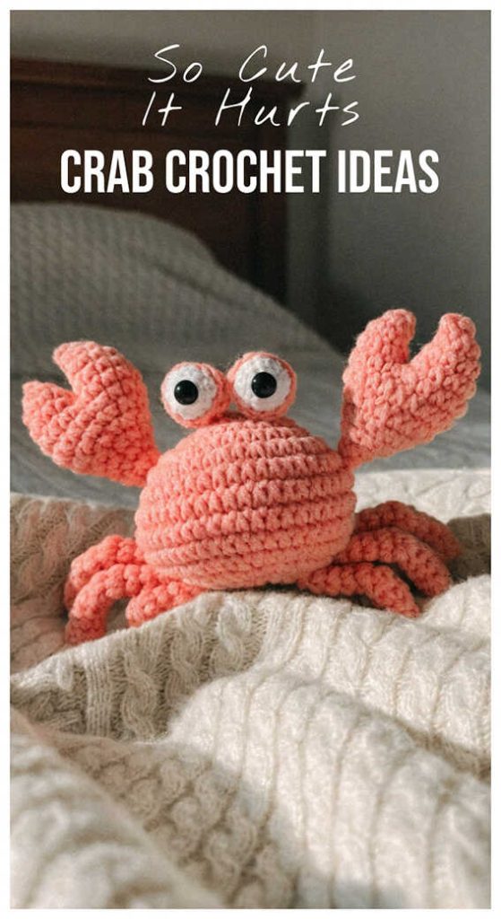 Crab amigurumi crochet plush toy on a cozy blanket